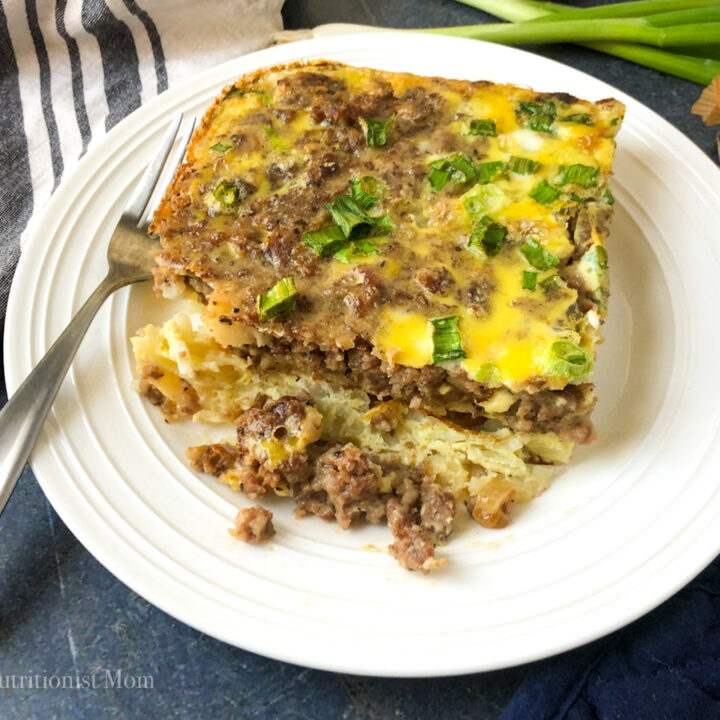 piece of high protein sausage egg casserole on a plate with a fork